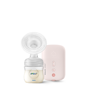 eine Milchpumpe und eine rosa Schachtel