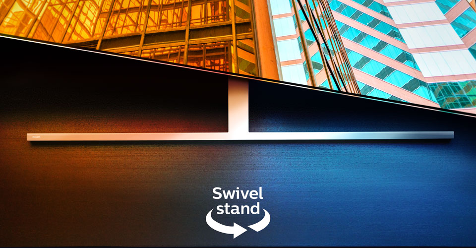 Un t&eacute;l&eacute;viseur Philips Ambilight sur un support pivotant affichant deux sc&egrave;nes architecturales color&eacute;es, avec une fl&egrave;che et un texte indiquant la fonction pivotante